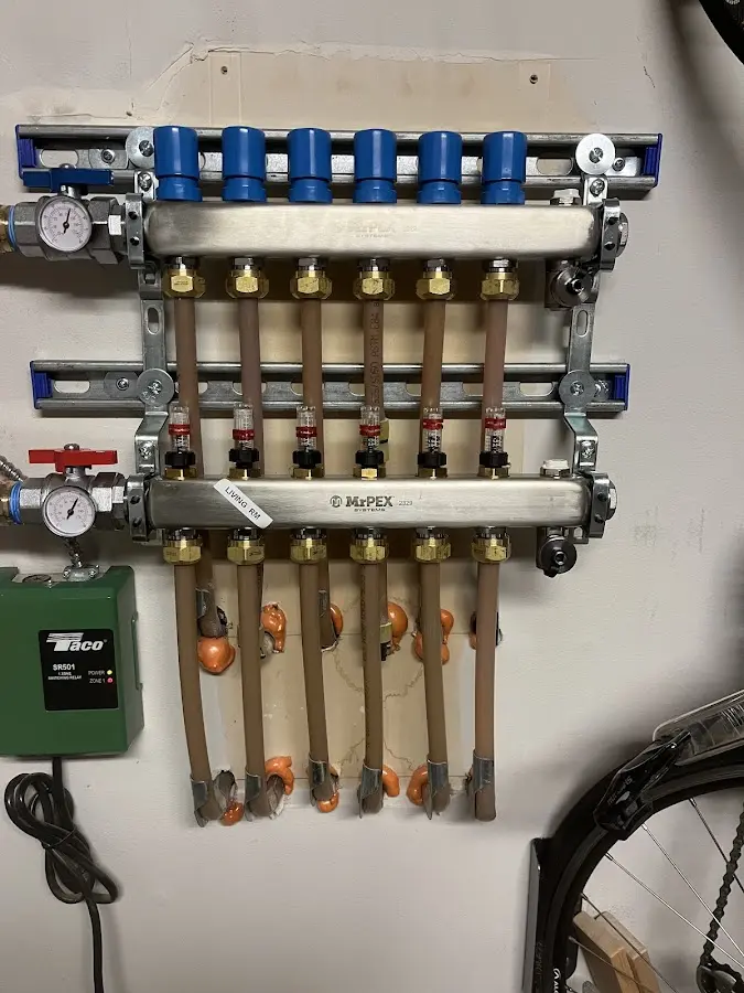 Plumber performing Gas Line Installation at a residential property in Gibson City